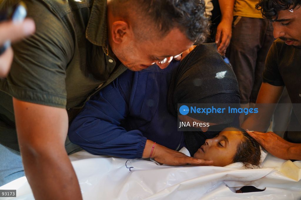 KHAN YOUNIS, GAZA STRIP, PALESTINE, SEPTEMBER 16, 2026: Relatives mourn and bid farewell to eight-year-old Amal Al-Mughayyir, who was reported killed in an Israeli strike the previous night in the Al-Mawasi area of Khan Younis, southern Gaza Strip. Photo by Ramzi Abu Amer / JNA Press. (Photo by Ramzi Abu Amer/JNA Press via Nexpher Images)