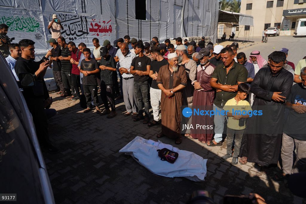 KHAN YOUNIS, GAZA STRIP, PALESTINE, SEPTEMBER 16, 2026: Relatives mourn and bid farewell to eight-year-old Amal Al-Mughayyir, who was reported killed in an Israeli strike the previous night in the Al-Mawasi area of Khan Younis, southern Gaza Strip. Photo by Ramzi Abu Amer / JNA Press. (Photo by Ramzi Abu Amer/JNA Press via Nexpher Images)