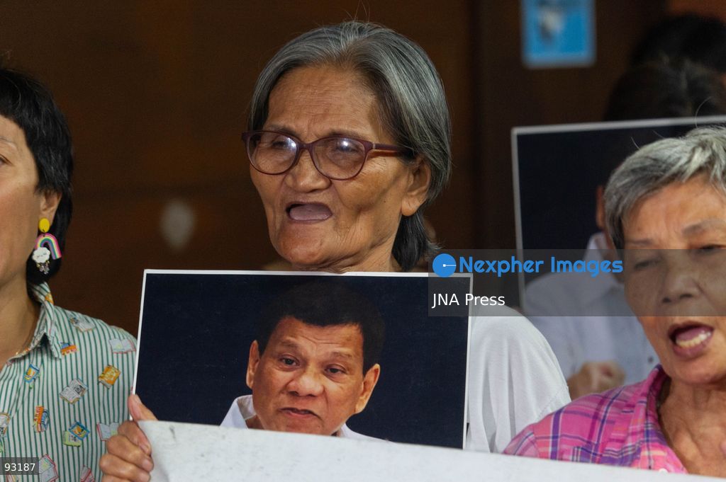 QUEZON CITY, PHILIPPINES, SEPTEMBER 16, 2026: Families of people killed during former Philippine President Rodrigo Duterte’s anti-drug campaign gather at the National Council of Churches in the Philippines in Quezon City to watch an International Criminal Court status conference in Duterte’s case. Duterte is facing proceedings before the ICC over alleged crimes against humanity committed during his anti-drug campaign. Photo by Charles Perez / JNA Press. (Photo by Charles Edmon S. Perez/JNA Press via Nexpher Images)