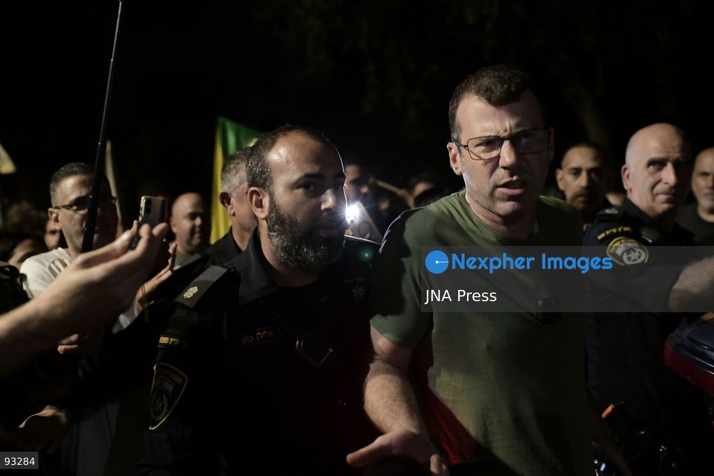 CENTRAL ISRAEL, SEPTEMBER 16, 2026: Right-wing Israeli activists protest outside the home of the parents of filmmaker Rachel Szor, co-director with Yuval Abraham of the documentary “NAZA.” The film, based on testimony from Israeli military and intelligence personnel, examines Israeli targeting practices and civilian casualties during the war in Gaza. The documentary has drawn strong criticism from Israeli political and military officials, while its filmmakers have received support from Israeli rights groups and members of the film industry. Photo by Tomer Neuberg / JNA Press. (Photo by Tomer Neuberg/JNA Press via Nexpher Images)