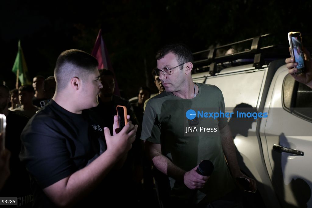 CENTRAL ISRAEL, SEPTEMBER 16, 2026: Right-wing Israeli activists protest outside the home of the parents of filmmaker Rachel Szor, co-director with Yuval Abraham of the documentary “NAZA.” The film, based on testimony from Israeli military and intelligence personnel, examines Israeli targeting practices and civilian casualties during the war in Gaza. The documentary has drawn strong criticism from Israeli political and military officials, while its filmmakers have received support from Israeli rights groups and members of the film industry. Photo by Tomer Neuberg / JNA Press. (Photo by Tomer Neuberg/JNA Press via Nexpher Images)
