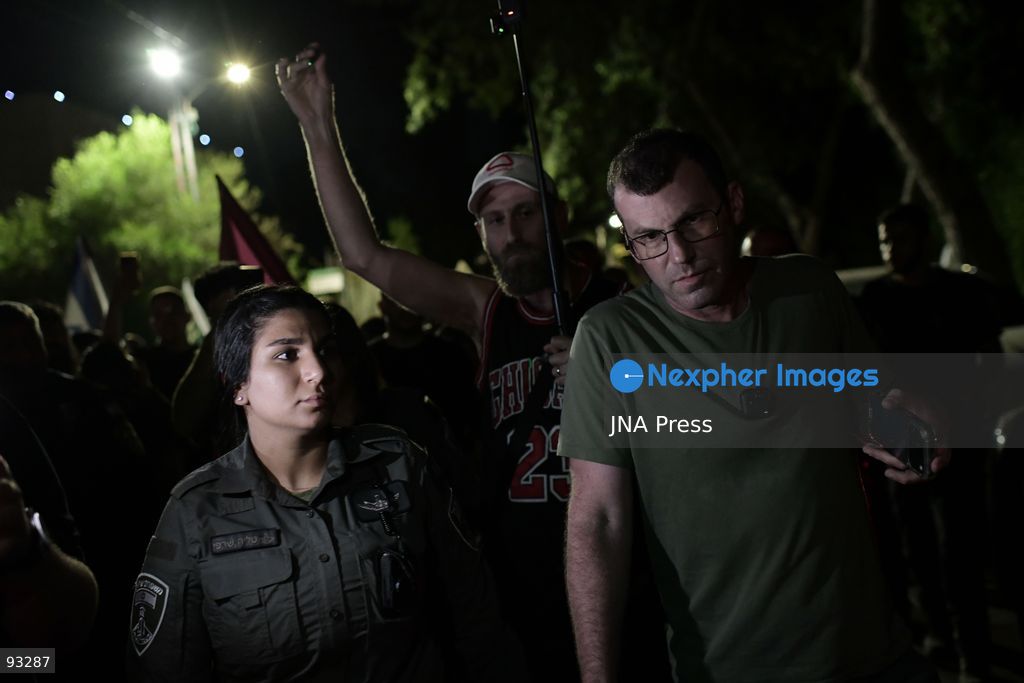 CENTRAL ISRAEL, SEPTEMBER 16, 2026: Right-wing Israeli activists protest outside the home of the parents of filmmaker Rachel Szor, co-director with Yuval Abraham of the documentary “NAZA.” The film, based on testimony from Israeli military and intelligence personnel, examines Israeli targeting practices and civilian casualties during the war in Gaza. The documentary has drawn strong criticism from Israeli political and military officials, while its filmmakers have received support from Israeli rights groups and members of the film industry. Photo by Tomer Neuberg / JNA Press. (Photo by Tomer Neuberg/JNA Press via Nexpher Images)