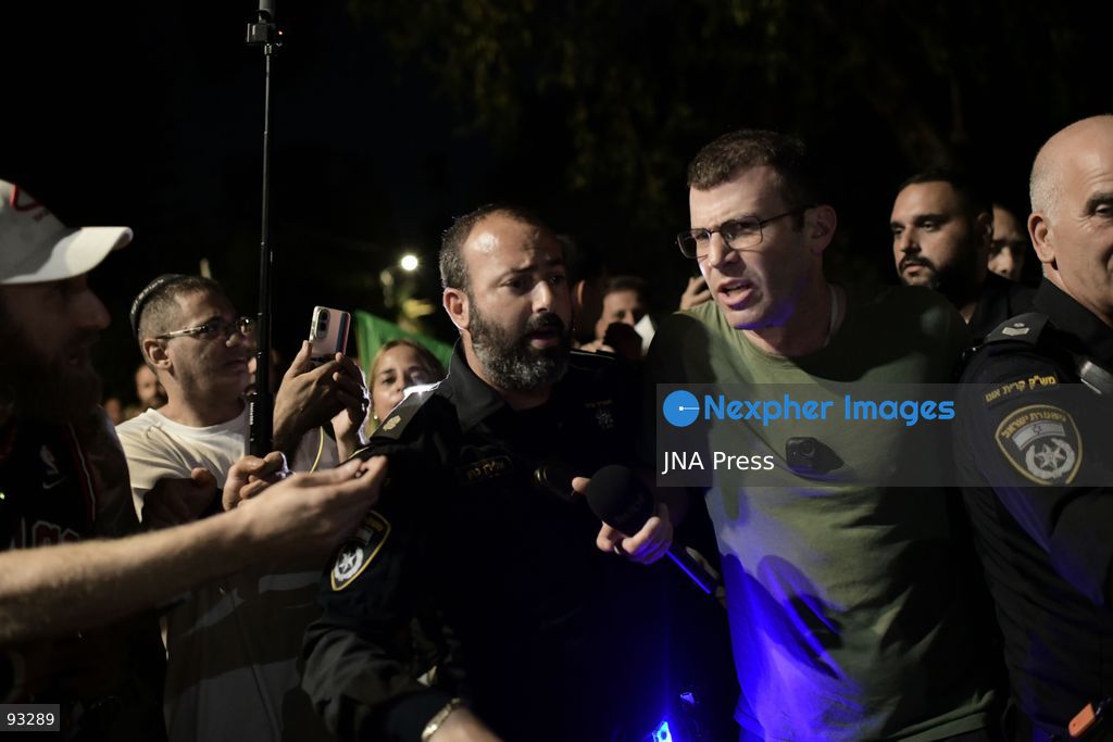 CENTRAL ISRAEL, SEPTEMBER 16, 2026: Right-wing Israeli activists protest outside the home of the parents of filmmaker Rachel Szor, co-director with Yuval Abraham of the documentary “NAZA.” The film, based on testimony from Israeli military and intelligence personnel, examines Israeli targeting practices and civilian casualties during the war in Gaza. The documentary has drawn strong criticism from Israeli political and military officials, while its filmmakers have received support from Israeli rights groups and members of the film industry. Photo by Tomer Neuberg / JNA Press. (Photo by Tomer Neuberg/JNA Press via Nexpher Images)