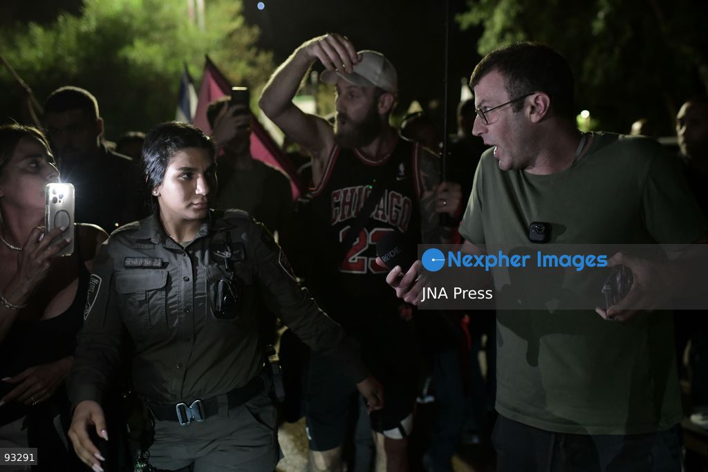 CENTRAL ISRAEL, SEPTEMBER 16, 2026: Right-wing Israeli activists protest outside the home of the parents of filmmaker Rachel Szor, co-director with Yuval Abraham of the documentary “NAZA.” The film, based on testimony from Israeli military and intelligence personnel, examines Israeli targeting practices and civilian casualties during the war in Gaza. The documentary has drawn strong criticism from Israeli political and military officials, while its filmmakers have received support from Israeli rights groups and members of the film industry. Photo by Tomer Neuberg / JNA Press. (Photo by Tomer Neuberg/JNA Press via Nexpher Images)