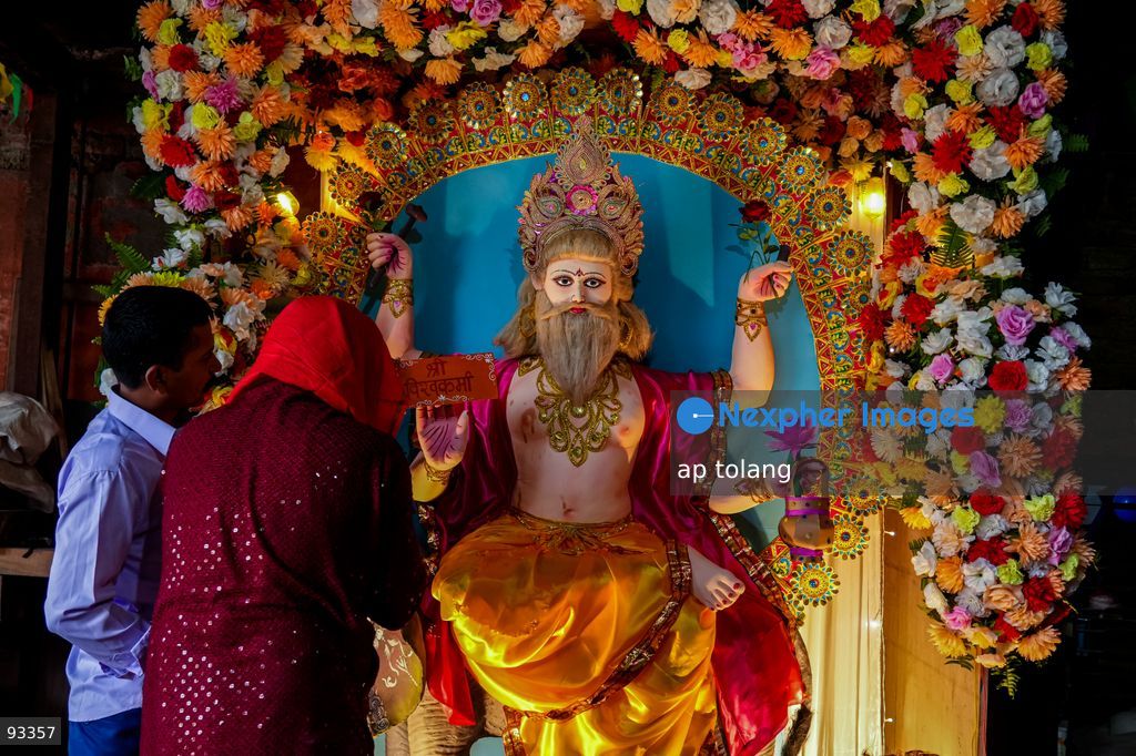 Lalitpur, Nepal - Septermber 17, 2026: Hindu devotees perform traditional rituals and prayers during  Bishwakarma  Puja, a festival dedicated to Lord Bishwakarma, in Lalitpur, Nepal. The festival is observed by worshipping tools, machinery, vehicles and equipment as devotees seek blessings for safety, prosperity and success. (Photo by ap tolang/Nexpher Images)
