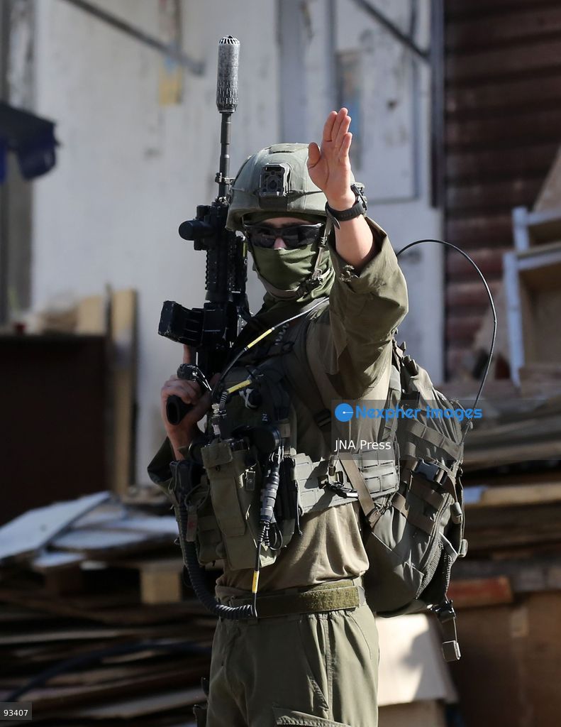 NABLUS, OCCUPIED WEST BANK, SEPTEMBER 17, 2026: Israeli troops move along a street during a military operation in Ein Beit al-Ma refugee camp, west of Nablus in the occupied West Bank. Photo by Nedal Shtieh / JNA Press. (Photo by Nedal Shtieh/JNA Press via Nexpher Images)