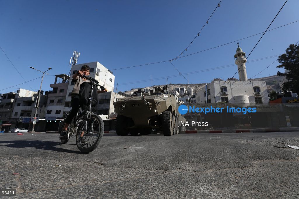 NABLUS, OCCUPIED WEST BANK, SEPTEMBER 17, 2026: Israeli troops move along a street during a military operation in Ein Beit al-Ma refugee camp, west of Nablus in the occupied West Bank. Photo by Nedal Shtieh / JNA Press. (Photo by Nedal Shtieh/JNA Press via Nexpher Images)