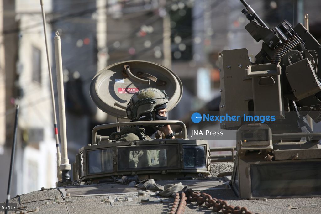 NABLUS, OCCUPIED WEST BANK, SEPTEMBER 17, 2026: Israeli troops move along a street during a military operation in Ein Beit al-Ma refugee camp, west of Nablus in the occupied West Bank. Photo by Nedal Shtieh / JNA Press. (Photo by Nedal Shtieh/JNA Press via Nexpher Images)