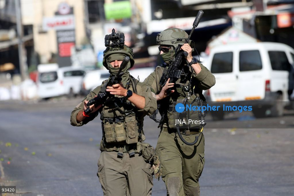 NABLUS, OCCUPIED WEST BANK, SEPTEMBER 17, 2026: Israeli troops move along a street during a military operation in Ein Beit al-Ma refugee camp, west of Nablus in the occupied West Bank. Photo by Nedal Shtieh / JNA Press. (Photo by Nedal Shtieh/JNA Press via Nexpher Images)