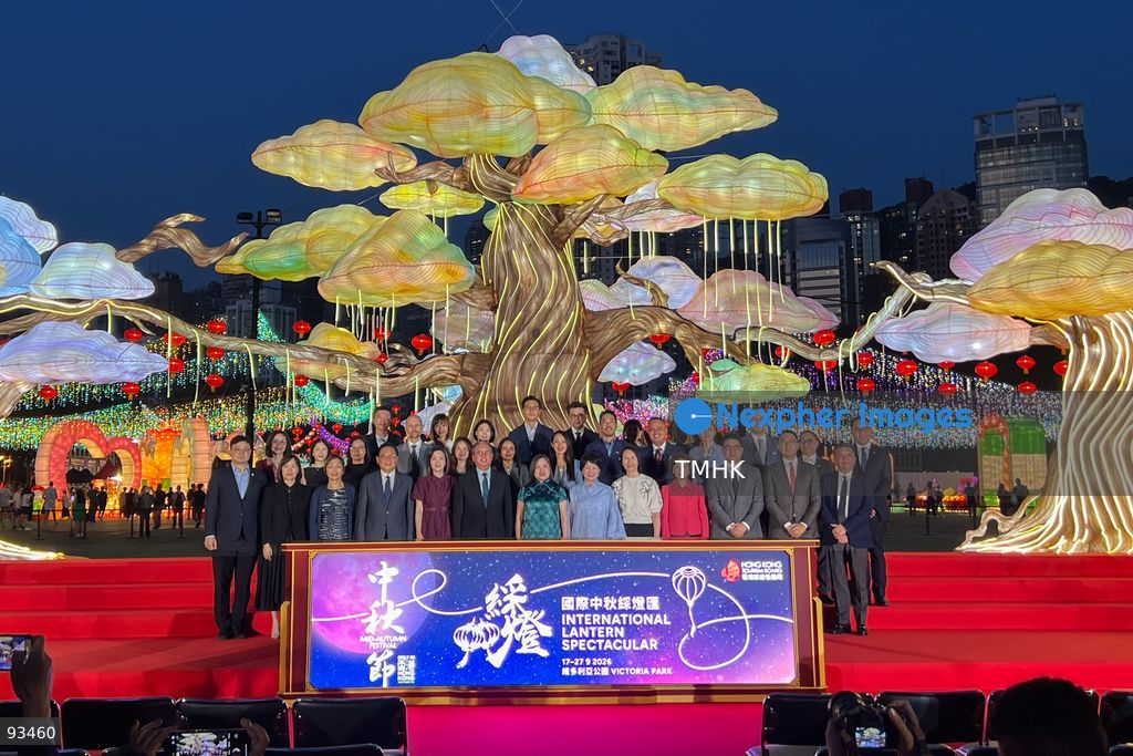 A medium view shows Secretary for Culture, Sports and Tourism Rosanna Law Shuk-pui; Hong Kong Tourism Board Chairman Dr. Peter Lam Kin-ngok; and Permanent Secretary for Culture, Sports and Tourism Joephy Shum Fung-kuen posing for a photo call with consular representatives and officiating guests during the opening ceremony of the "International Mid-Autumn Lantern Carnival" at Victoria Park on September 17, 2026 in Hong Kong. (Photo by Peter Tsang/TMHK via Nexpher Images)