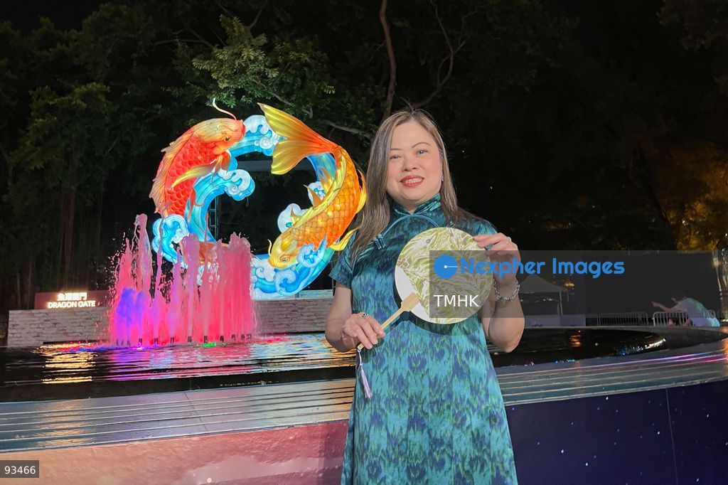 Secretary for Culture, Sports and Tourism Rosanna Law Shuk-pui poses with a festive lantern display during her visit to the "International Mid-Autumn Lantern Carnival" at Victoria Park on September 17, 2026 in Hong Kong. (Photo by Peter Tsang/TMHK via Nexpher Images)