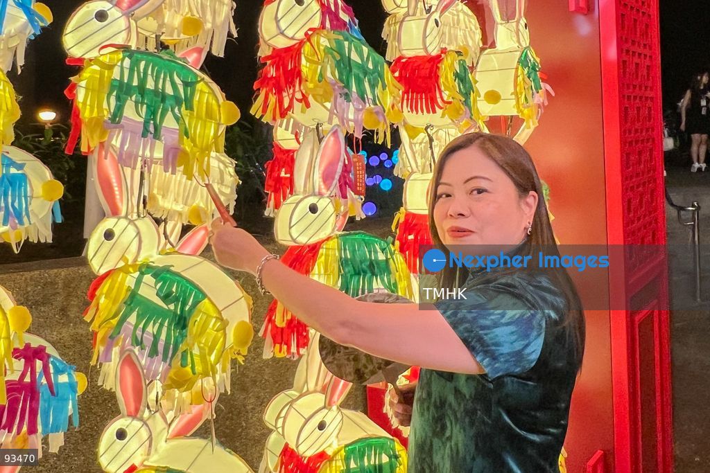 Secretary for Culture, Sports and Tourism Rosanna Law Shuk-pui poses with a festive lantern display during her visit to the "International Mid-Autumn Lantern Carnival" at Victoria Park on September 17, 2026 in Hong Kong. (Photo by Peter Tsang/TMHK via Nexpher Images)