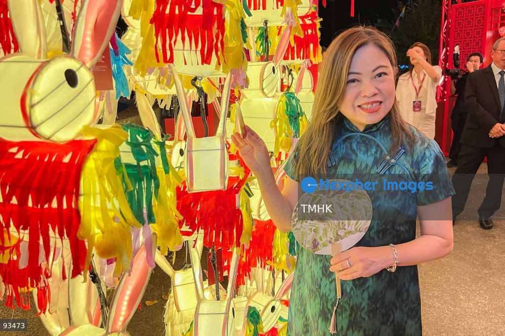 Secretary for Culture, Sports and Tourism Rosanna Law Shuk-pui poses with a festive lantern display during her visit to the "International Mid-Autumn Lantern Carnival" at Victoria Park on September 17, 2026 in Hong Kong. (Photo by Peter Tsang/TMHK via Nexpher Images)