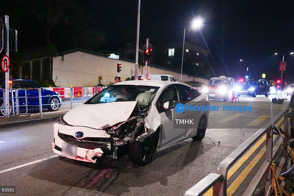 A view shows a white Toyota Prius private car, its license plate blurred in accordance with privacy practice, with severe damage to its front left section and deployed airbags following a collision with another vehicle on Hiram's Highway near the junction with Po Lo Che Road on September 17, 2026 in Hong Kong. (Photo by Zulu Lo/TMHK via Nexpher Images)