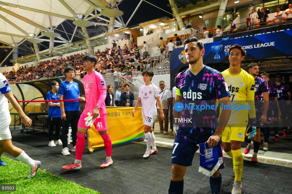 Players of Kitchee and Gangwon FC walk onto the pitch ahead of the AFC Champions League Two group stage match at Mong Kok Stadium on September 17, 2026 in Hong Kong. (Photo by Zulu Lo/TMHK via Nexpher Images)