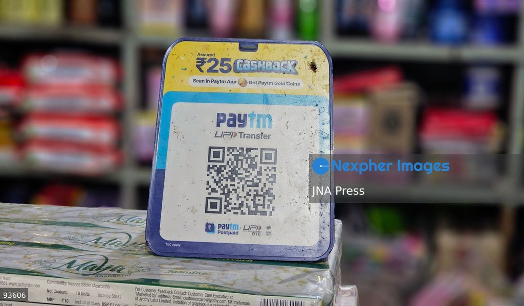 SRINAGAR, KASHMIR, INDIA, SEPTEMBER 16, 2026: A customer scans a Unified Payments Interface (UPI) QR code to make a digital payment using a smartphone at a shop in Srinagar. From October 15, India will introduce a 0.4% Merchant Discount Rate (MDR) on certain person-to-merchant UPI transactions above ₹2,000, while consumers will not be directly charged. Photo by Umer Qadir / JNA Press. (Photo by Umer Qadir/JNA Press via Nexpher Images)