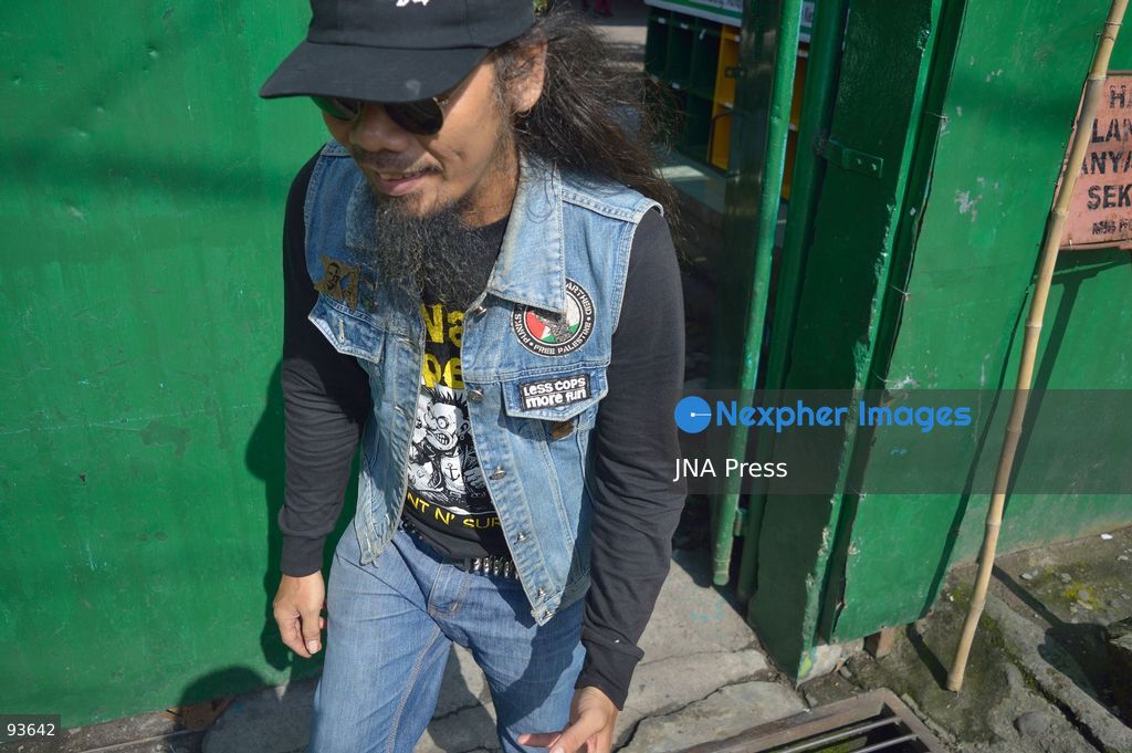 MEDAN, NORTH SUMATRA, INDONESIA, SEPTEMBER 17, 2026: The reflection of musician Jovan Siahaan, 42, appears on a smartphone displaying the Suno AI music platform as he arranges compositions for his digital solo project, Agent AI, in Medan, North Sumatra. Siahaan, who works as the project’s arranger and vocalist, uses artificial intelligence tools during the production process before adding his own vocal recordings to songs addressing social issues. The project is scheduled to perform at the Medanfor Thepunx #6 event. Photo by Sutanta Aditya / JNA Press. (Photo by Sutanta Aditya/JNA Press via Nexpher Images)