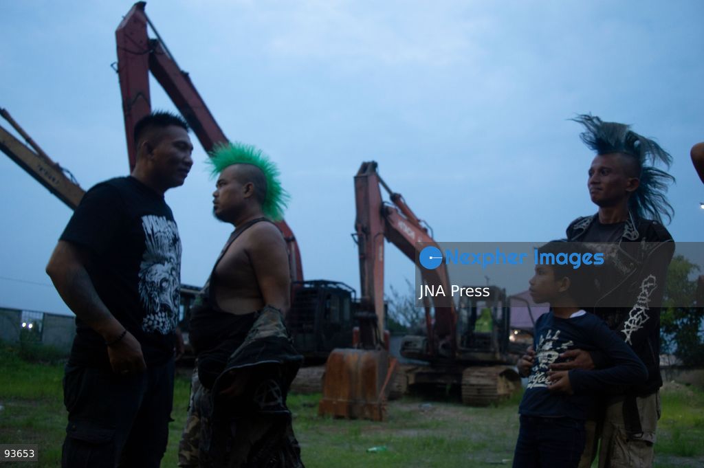 MEDAN, NORTH SUMATRA, INDONESIA, SEPTEMBER 17, 2026: The reflection of musician Jovan Siahaan, 42, appears on a smartphone displaying the Suno AI music platform as he arranges compositions for his digital solo project, Agent AI, in Medan, North Sumatra. Siahaan, who works as the project’s arranger and vocalist, uses artificial intelligence tools during the production process before adding his own vocal recordings to songs addressing social issues. The project is scheduled to perform at the Medanfor Thepunx #6 event. Photo by Sutanta Aditya / JNA Press. (Photo by Sutanta Aditya/JNA Press via Nexpher Images)