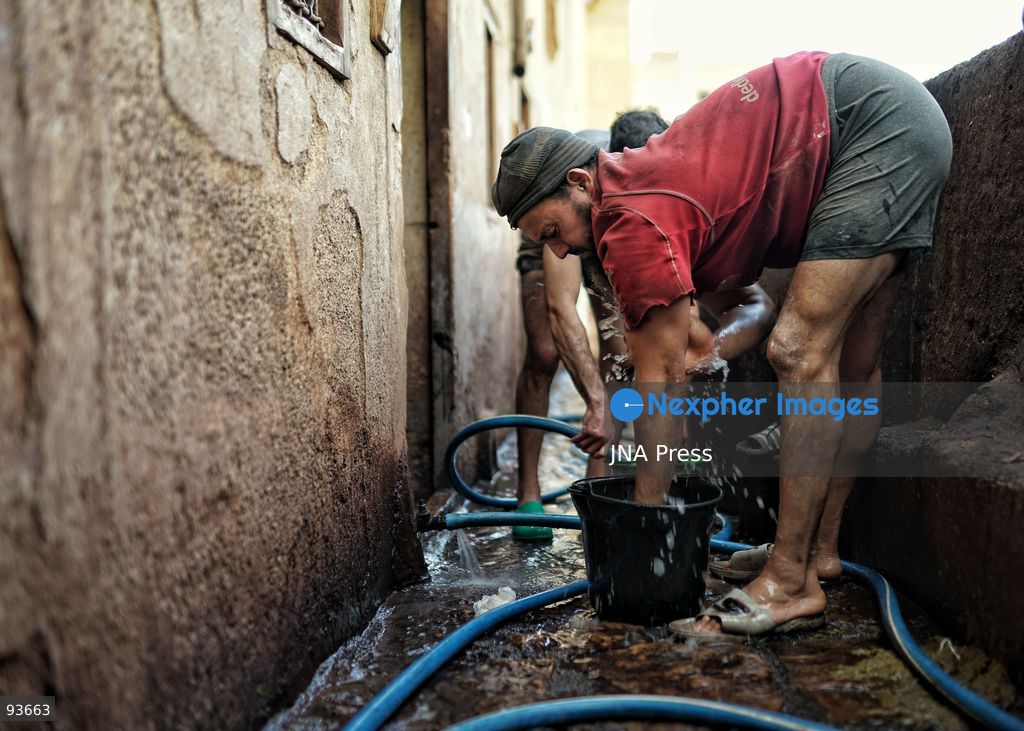 FEZ, MOROCCO, SEPTEMBER 17, 2026: Workers process and dye leather using traditional methods at the historic Chouara Tannery in Fez. The centuries-old tannery is known for its stone vats, where hides are treated and dyed by hand as part of a leather-making tradition that remains active in the city’s old medina. Photo by Berke Arakli / JNA Press. (Photo by Berke Araklı/JNA Press via Nexpher Images)