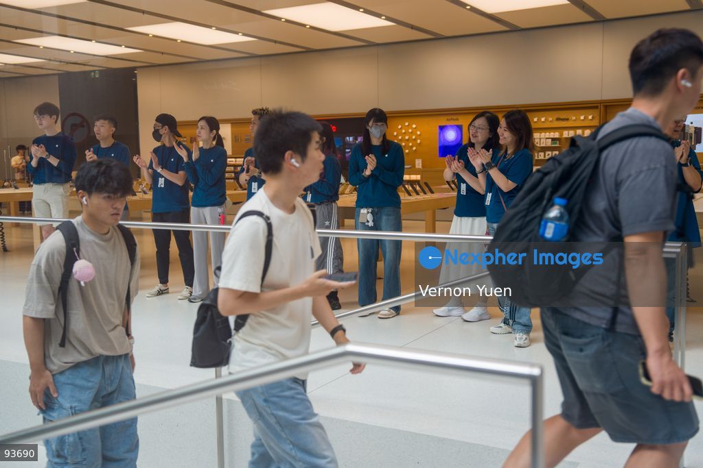 Buyers arriving at an apple store on the first day on sale of the iphone 18 pro on September 18, 2026 in Hong Kong. (Photo by Vernon Yuen/Nexpher Images)