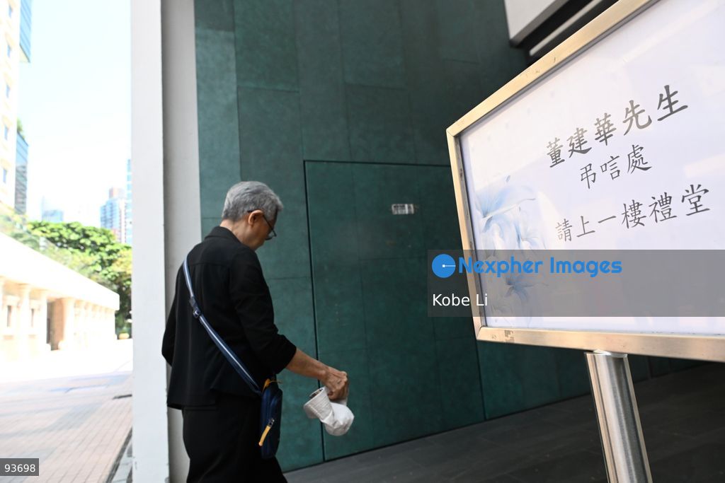 A woman arriving a condolence points at Moreton Terrace Activities Centre to condolence Tung Chee Hwa on September 18, 2026 in Hong Kong. Tung Chee Hwa, a former vice-chairman of the Chinese People's Political Consultative Conference National Committee passed away on September 8, 2026, aged 89. (Photo by Kobe Li/Nexpher Images)