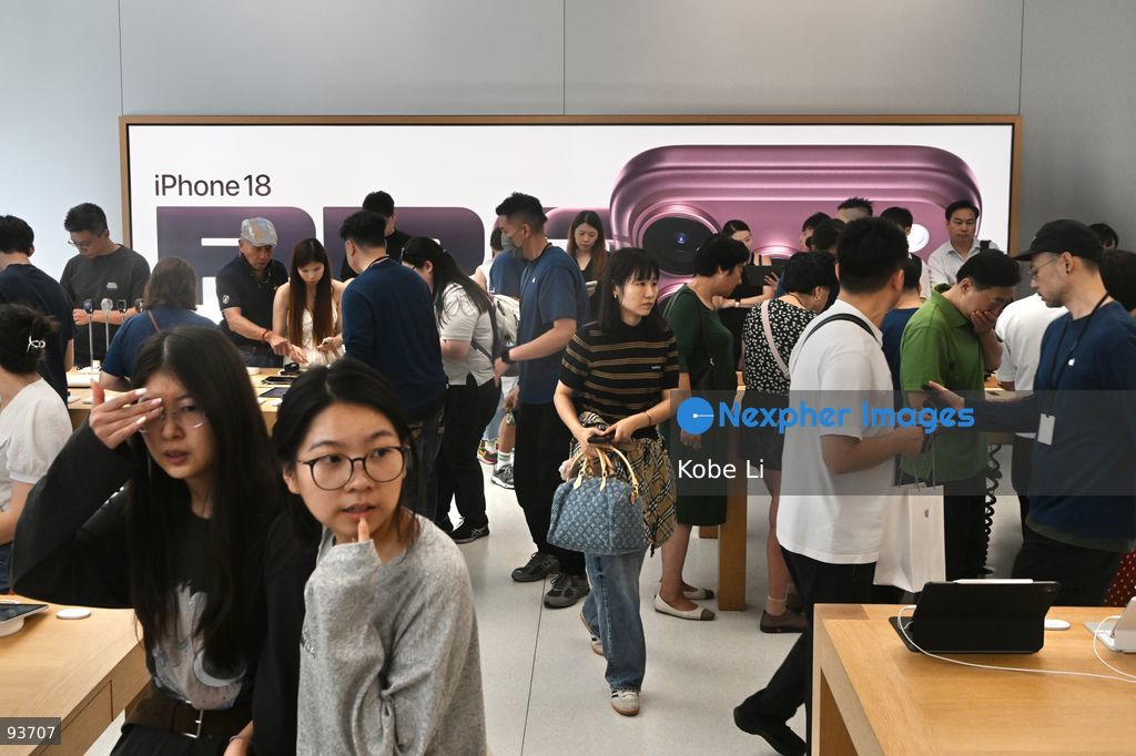 People playing Iphone 18 Pro at an apple store on the first day on sale of the iphone 18 pro on September 18, 2026 in Hong Kong. (Photo by Kobe Li/Nexpher Images)