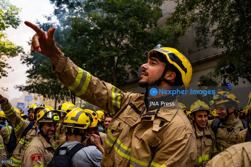 BARCELONA, SPAIN, SEPTEMBER 18, 2026: Firefighters from the Generalitat de Catalunya demonstrate outside the regional Interior Department in Barcelona during a protest demanding better pay, improved protective equipment and increased staffing and resources. Around 800 firefighters took part in the march from Plaça de Sant Jaume, according to Barcelona’s municipal police. Protesters used pyrotechnics and smoke flares as the demonstration intensified outside the Interior Department. Photo by Marc Asensio Clupés / JNA Press. (Photo by Marc Asensio Clupes/JNA Press via Nexpher Images)