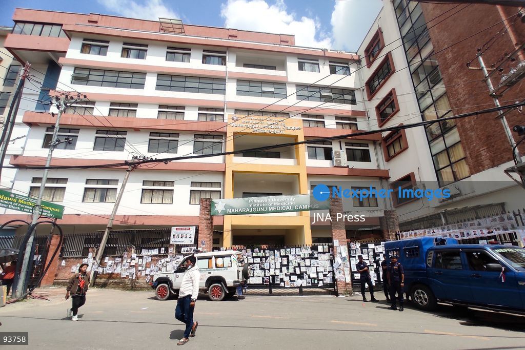 KATHMANDU, NEPAL, SEPTEMBER 18, 2026: Bodies of approximately 50 unidentified victims of the August 26 flash floods are transported for temporary burial at Gokarneshwor in Kathmandu as authorities continue efforts to identify those recovered from the disaster. Relatives wait at the morgue of Tribhuvan University Teaching Hospital, where photographs of people reported missing are displayed to assist families searching for loved ones. Authorities are collecting DNA samples and maintaining records of unidentified remains to allow future identification and return to relatives. The floods that struck the Bhote Koshi and Trishuli river systems have killed at least 1,410 people, with thousands still reported missing. Photo by Safal Prakash Shrestha / JNA Press. (Photo by Safal Prakash Shrestha/JNA Press via Nexpher Images)