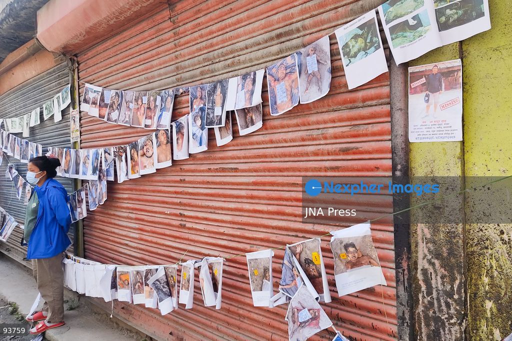KATHMANDU, NEPAL, SEPTEMBER 18, 2026: Bodies of approximately 50 unidentified victims of the August 26 flash floods are transported for temporary burial at Gokarneshwor in Kathmandu as authorities continue efforts to identify those recovered from the disaster. Relatives wait at the morgue of Tribhuvan University Teaching Hospital, where photographs of people reported missing are displayed to assist families searching for loved ones. Authorities are collecting DNA samples and maintaining records of unidentified remains to allow future identification and return to relatives. The floods that struck the Bhote Koshi and Trishuli river systems have killed at least 1,410 people, with thousands still reported missing. Photo by Safal Prakash Shrestha / JNA Press. (Photo by Safal Prakash Shrestha/JNA Press via Nexpher Images)