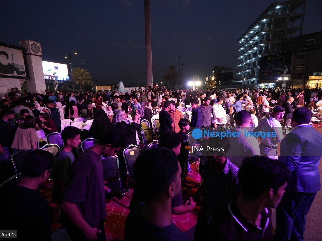BAGHDAD, IRAQ, SEPTEMBER 18, 2026: Visitors attend the third edition of the Book Festival at Muzaffar Square in Sadr City, eastern Baghdad. Organizers distributed 12,000 books free of charge during the event, which aims to encourage reading and make books more accessible to the local community. Photo by Muntazer Sahip/ JNA Press. (Photo by Muntazer Uday Sahib/JNA Press via Nexpher Images)