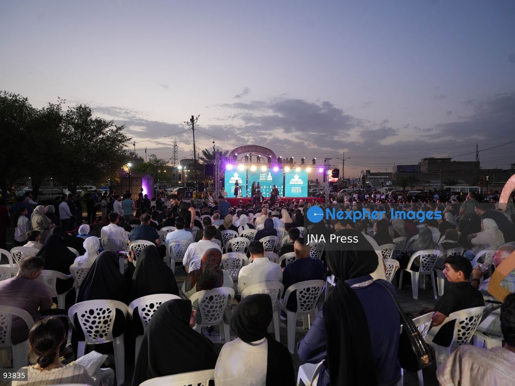 BAGHDAD, IRAQ, SEPTEMBER 18, 2026: Visitors attend the third edition of the Book Festival at Muzaffar Square in Sadr City, eastern Baghdad. Organizers distributed 12,000 books free of charge during the event, which aims to encourage reading and make books more accessible to the local community. Photo by Muntazer Sahip/ JNA Press. (Photo by Muntazer Uday Sahib/JNA Press via Nexpher Images)