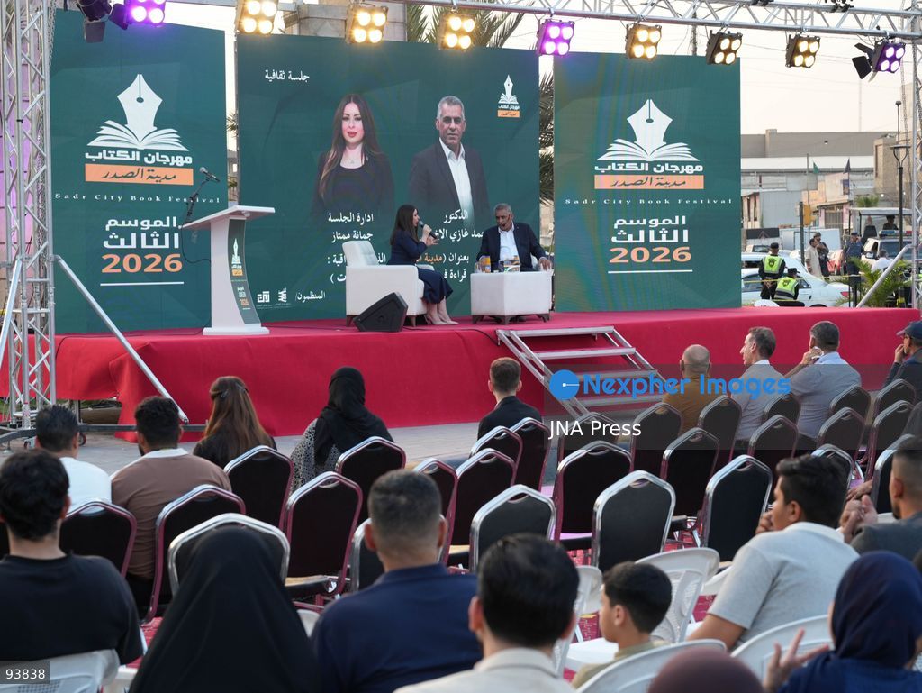 BAGHDAD, IRAQ, SEPTEMBER 18, 2026: Visitors attend the third edition of the Book Festival at Muzaffar Square in Sadr City, eastern Baghdad. Organizers distributed 12,000 books free of charge during the event, which aims to encourage reading and make books more accessible to the local community. Photo by Muntazer Sahip/ JNA Press. (Photo by Muntazer Uday Sahib/JNA Press via Nexpher Images)
