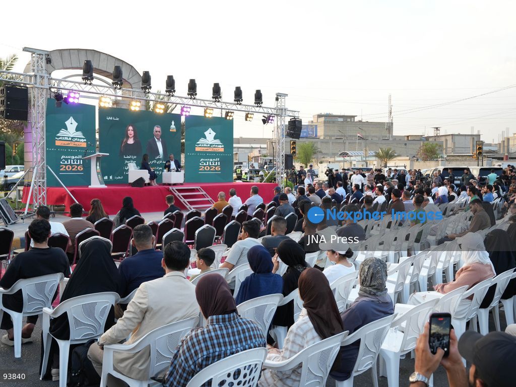 BAGHDAD, IRAQ, SEPTEMBER 18, 2026: Visitors attend the third edition of the Book Festival at Muzaffar Square in Sadr City, eastern Baghdad. Organizers distributed 12,000 books free of charge during the event, which aims to encourage reading and make books more accessible to the local community. Photo by Muntazer Sahip/ JNA Press. (Photo by Muntazer Uday Sahib/JNA Press via Nexpher Images)