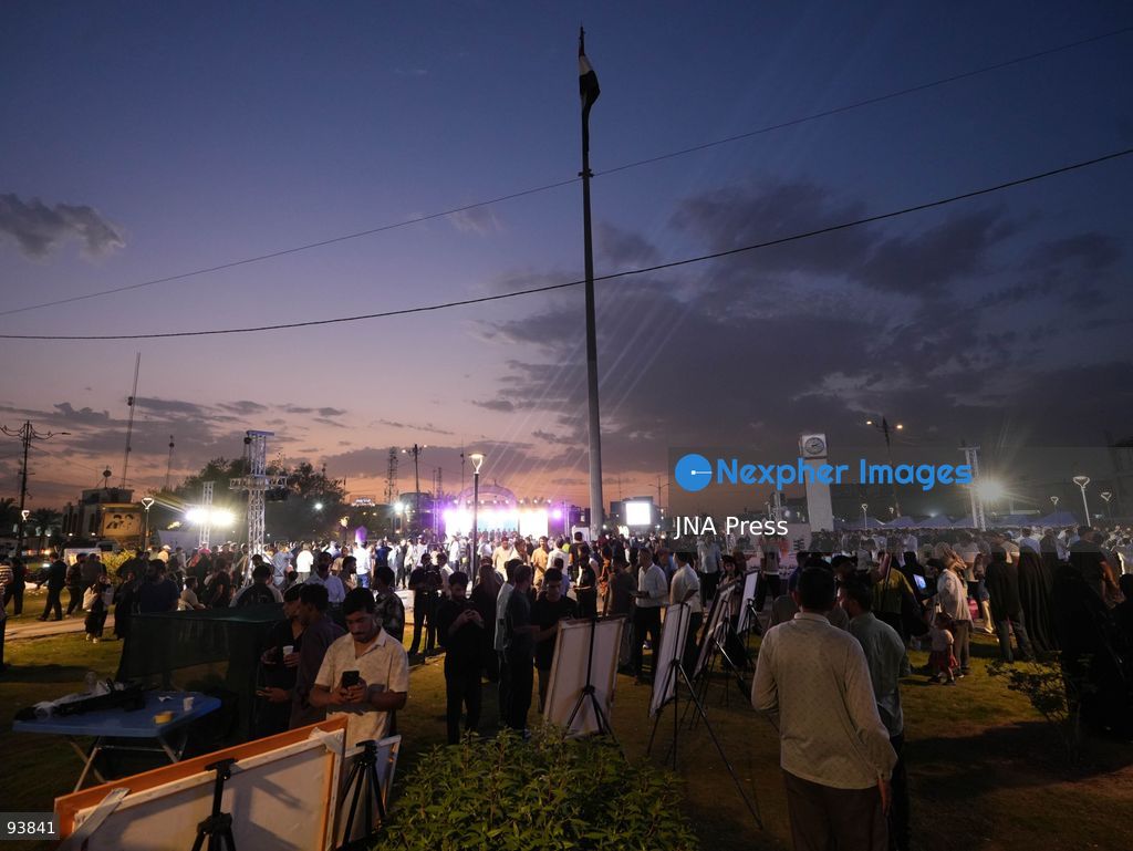 BAGHDAD, IRAQ, SEPTEMBER 18, 2026: Visitors attend the third edition of the Book Festival at Muzaffar Square in Sadr City, eastern Baghdad. Organizers distributed 12,000 books free of charge during the event, which aims to encourage reading and make books more accessible to the local community. Photo by Muntazer Sahip/ JNA Press. (Photo by Muntazer Uday Sahib/JNA Press via Nexpher Images)