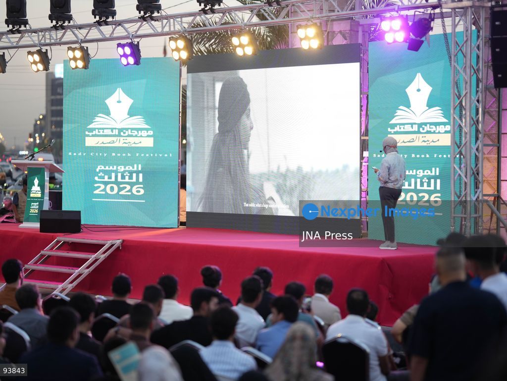 BAGHDAD, IRAQ, SEPTEMBER 18, 2026: Visitors attend the third edition of the Book Festival at Muzaffar Square in Sadr City, eastern Baghdad. Organizers distributed 12,000 books free of charge during the event, which aims to encourage reading and make books more accessible to the local community. Photo by Muntazer Sahip/ JNA Press. (Photo by Muntazer Uday Sahib/JNA Press via Nexpher Images)