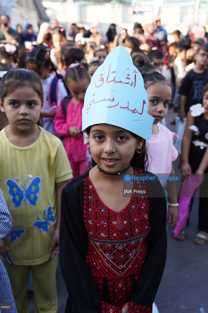 NUSEIRAT, GAZA STRIP, SEPTEMBER 19, 2026: Palestinian children return to classrooms at an UNRWA school in Nuseirat refugee camp in the central Gaza Strip as in-person education gradually resumes following years of disruption caused by the war. The return comes as the new academic year begins in Gaza, where widespread destruction, displacement and the use of school buildings as shelters have severely disrupted access to education. Photo by Ramzi Abu Amer / JNA Press. (Photo by Ramzi Abu Amer/JNA Press via Nexpher Images)