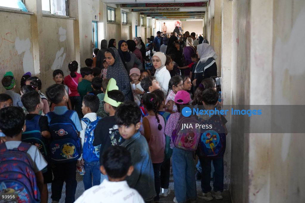 NUSEIRAT, GAZA STRIP, SEPTEMBER 19, 2026: Palestinian children return to classrooms at an UNRWA school in Nuseirat refugee camp in the central Gaza Strip as in-person education gradually resumes following years of disruption caused by the war. The return comes as the new academic year begins in Gaza, where widespread destruction, displacement and the use of school buildings as shelters have severely disrupted access to education. Photo by Ramzi Abu Amer / JNA Press. (Photo by Ramzi Abu Amer/JNA Press via Nexpher Images)