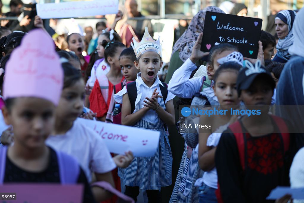 NUSEIRAT, GAZA STRIP, SEPTEMBER 19, 2026: Palestinian children return to classrooms at an UNRWA school in Nuseirat refugee camp in the central Gaza Strip as in-person education gradually resumes following years of disruption caused by the war. The return comes as the new academic year begins in Gaza, where widespread destruction, displacement and the use of school buildings as shelters have severely disrupted access to education. Photo by Ramzi Abu Amer / JNA Press. (Photo by Ramzi Abu Amer/JNA Press via Nexpher Images)