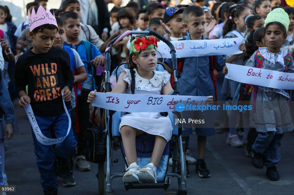 NUSEIRAT, GAZA STRIP, SEPTEMBER 19, 2026: Palestinian children return to classrooms at an UNRWA school in Nuseirat refugee camp in the central Gaza Strip as in-person education gradually resumes following years of disruption caused by the war. The return comes as the new academic year begins in Gaza, where widespread destruction, displacement and the use of school buildings as shelters have severely disrupted access to education. Photo by Ramzi Abu Amer / JNA Press. (Photo by Ramzi Abu Amer/JNA Press via Nexpher Images)