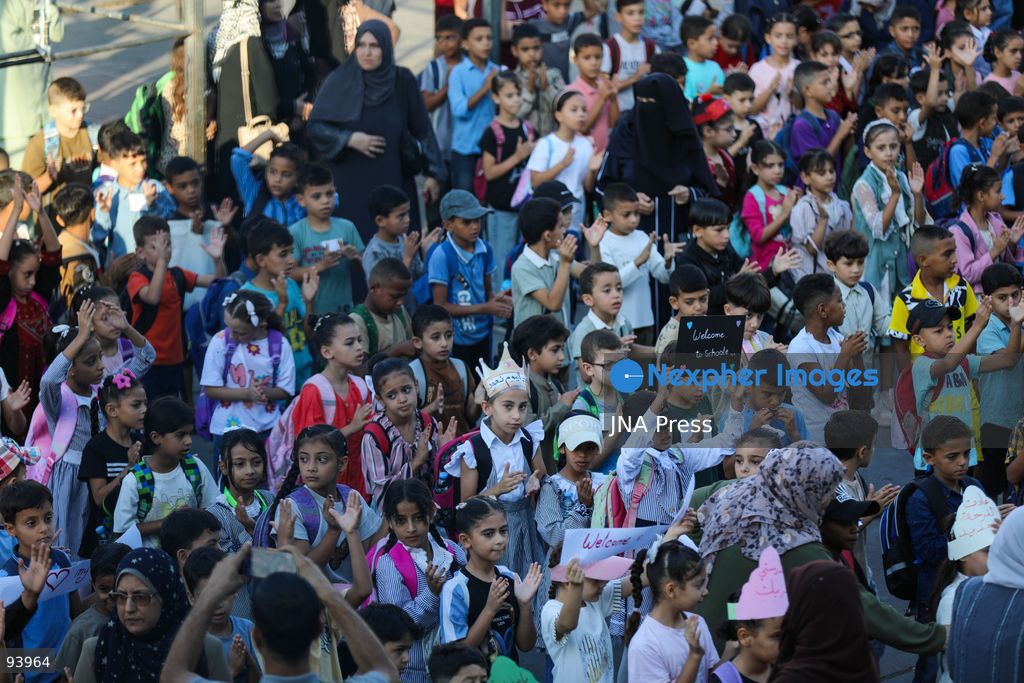 NUSEIRAT, GAZA STRIP, SEPTEMBER 19, 2026: Palestinian children return to classrooms at an UNRWA school in Nuseirat refugee camp in the central Gaza Strip as in-person education gradually resumes following years of disruption caused by the war. The return comes as the new academic year begins in Gaza, where widespread destruction, displacement and the use of school buildings as shelters have severely disrupted access to education. Photo by Ramzi Abu Amer / JNA Press. (Photo by Ramzi Abu Amer/JNA Press via Nexpher Images)