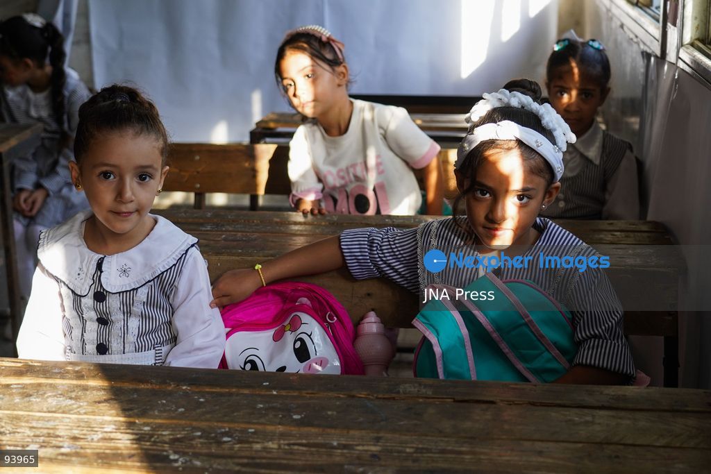 NUSEIRAT, GAZA STRIP, SEPTEMBER 19, 2026: Palestinian children return to classrooms at an UNRWA school in Nuseirat refugee camp in the central Gaza Strip as in-person education gradually resumes following years of disruption caused by the war. The return comes as the new academic year begins in Gaza, where widespread destruction, displacement and the use of school buildings as shelters have severely disrupted access to education. Photo by Ramzi Abu Amer / JNA Press. (Photo by Ramzi Abu Amer/JNA Press via Nexpher Images)
