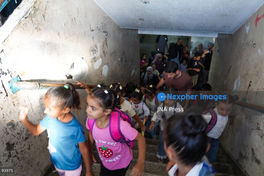 NUSEIRAT, GAZA STRIP, SEPTEMBER 19, 2026: Palestinian children return to classrooms at an UNRWA school in Nuseirat refugee camp in the central Gaza Strip as in-person education gradually resumes following years of disruption caused by the war. The return comes as the new academic year begins in Gaza, where widespread destruction, displacement and the use of school buildings as shelters have severely disrupted access to education. Photo by Ramzi Abu Amer / JNA Press. (Photo by Ramzi Abu Amer/JNA Press via Nexpher Images)