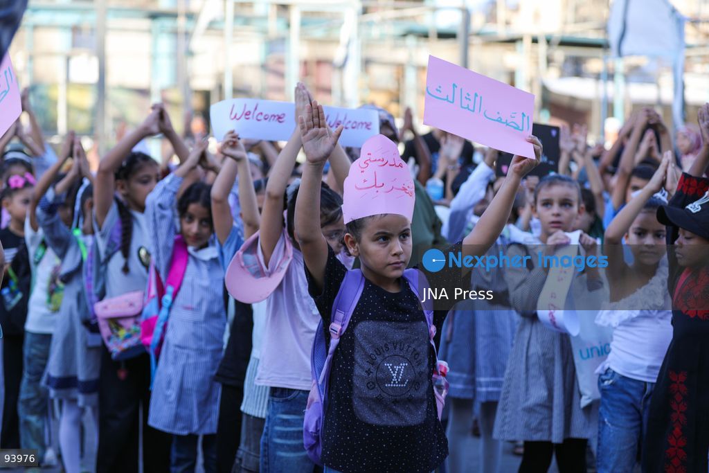 NUSEIRAT, GAZA STRIP, SEPTEMBER 19, 2026: Palestinian children return to classrooms at an UNRWA school in Nuseirat refugee camp in the central Gaza Strip as in-person education gradually resumes following years of disruption caused by the war. The return comes as the new academic year begins in Gaza, where widespread destruction, displacement and the use of school buildings as shelters have severely disrupted access to education. Photo by Ramzi Abu Amer / JNA Press. (Photo by Ramzi Abu Amer/JNA Press via Nexpher Images)