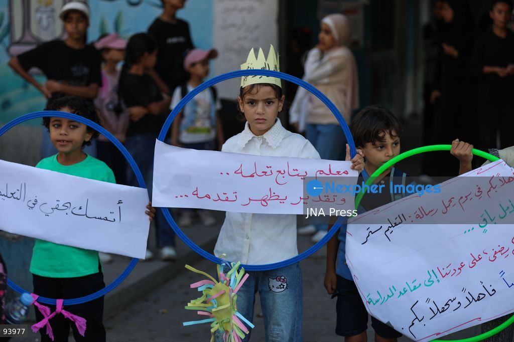 NUSEIRAT, GAZA STRIP, SEPTEMBER 19, 2026: Palestinian children return to classrooms at an UNRWA school in Nuseirat refugee camp in the central Gaza Strip as in-person education gradually resumes following years of disruption caused by the war. The return comes as the new academic year begins in Gaza, where widespread destruction, displacement and the use of school buildings as shelters have severely disrupted access to education. Photo by Ramzi Abu Amer / JNA Press. (Photo by Ramzi Abu Amer/JNA Press via Nexpher Images)