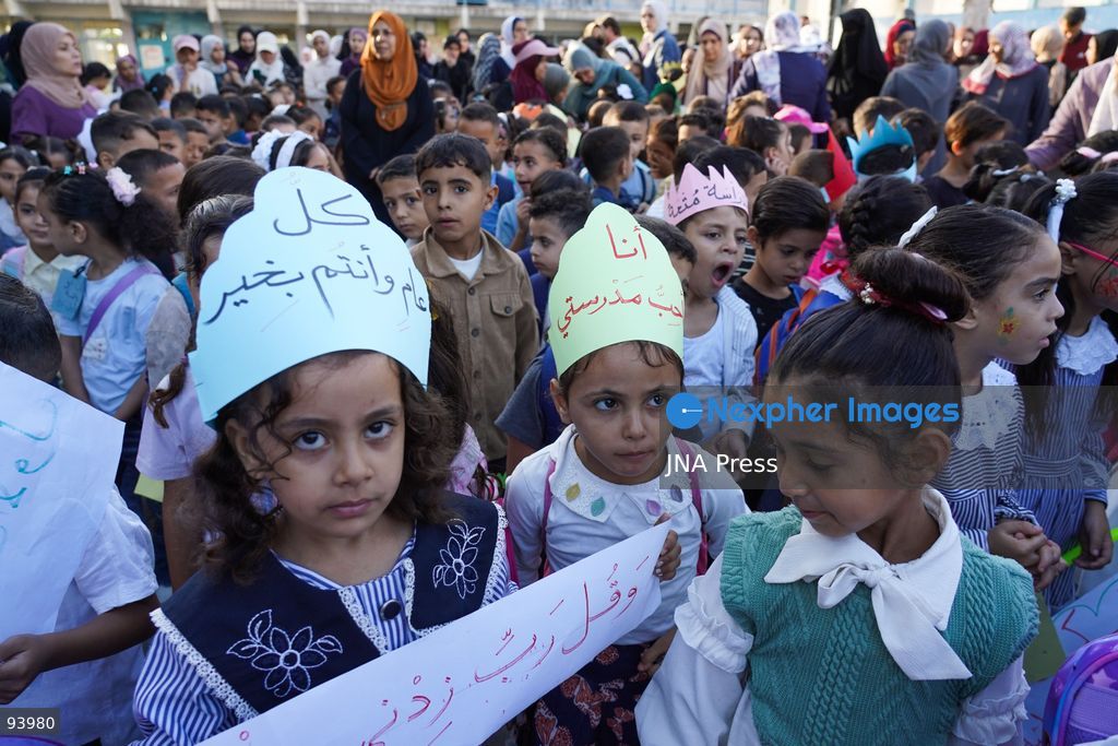 NUSEIRAT, GAZA STRIP, SEPTEMBER 19, 2026: Palestinian children return to classrooms at an UNRWA school in Nuseirat refugee camp in the central Gaza Strip as in-person education gradually resumes following years of disruption caused by the war. The return comes as the new academic year begins in Gaza, where widespread destruction, displacement and the use of school buildings as shelters have severely disrupted access to education. Photo by Ramzi Abu Amer / JNA Press. (Photo by Ramzi Abu Amer/JNA Press via Nexpher Images)
