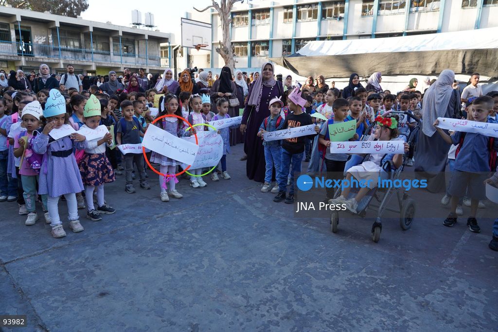 NUSEIRAT, GAZA STRIP, SEPTEMBER 19, 2026: Palestinian children return to classrooms at an UNRWA school in Nuseirat refugee camp in the central Gaza Strip as in-person education gradually resumes following years of disruption caused by the war. The return comes as the new academic year begins in Gaza, where widespread destruction, displacement and the use of school buildings as shelters have severely disrupted access to education. Photo by Ramzi Abu Amer / JNA Press. (Photo by Ramzi Abu Amer/JNA Press via Nexpher Images)