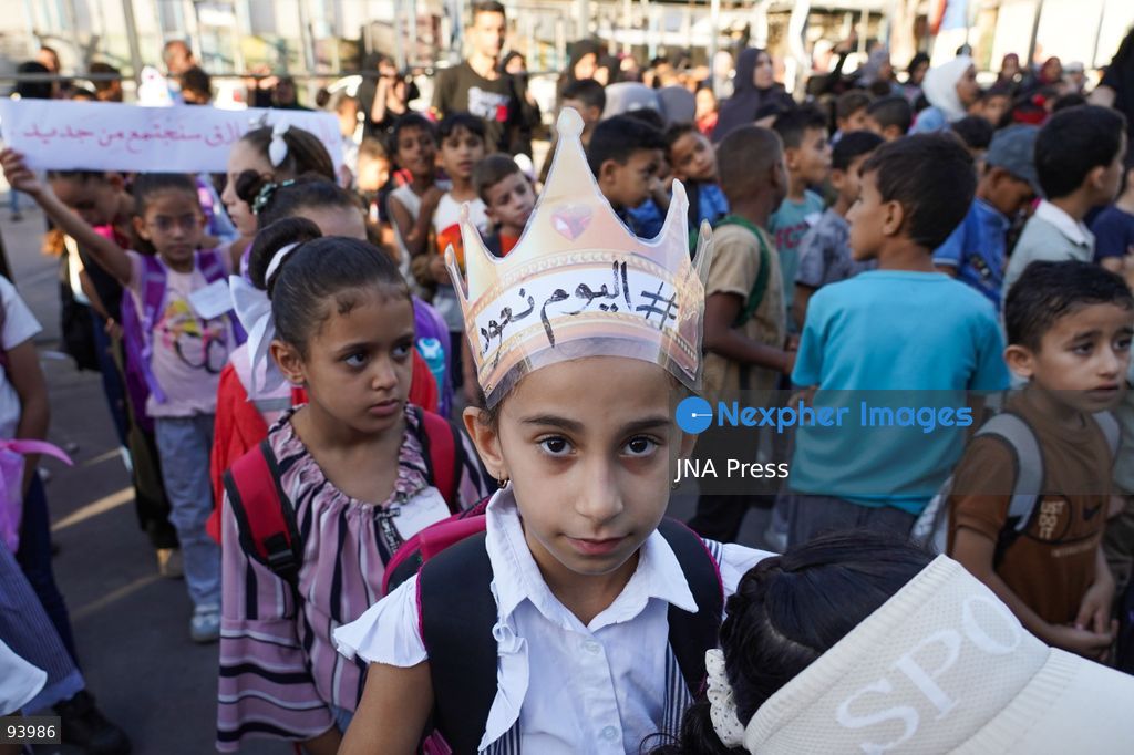 NUSEIRAT, GAZA STRIP, SEPTEMBER 19, 2026: Palestinian children return to classrooms at an UNRWA school in Nuseirat refugee camp in the central Gaza Strip as in-person education gradually resumes following years of disruption caused by the war. The return comes as the new academic year begins in Gaza, where widespread destruction, displacement and the use of school buildings as shelters have severely disrupted access to education. Photo by Ramzi Abu Amer / JNA Press. (Photo by Ramzi Abu Amer/JNA Press via Nexpher Images)