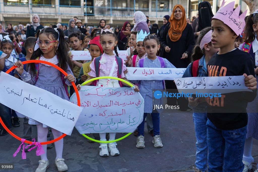 NUSEIRAT, GAZA STRIP, SEPTEMBER 19, 2026: Palestinian children return to classrooms at an UNRWA school in Nuseirat refugee camp in the central Gaza Strip as in-person education gradually resumes following years of disruption caused by the war. The return comes as the new academic year begins in Gaza, where widespread destruction, displacement and the use of school buildings as shelters have severely disrupted access to education. Photo by Ramzi Abu Amer / JNA Press. (Photo by Ramzi Abu Amer/JNA Press via Nexpher Images)