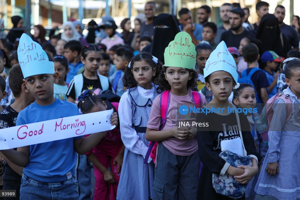 NUSEIRAT, GAZA STRIP, SEPTEMBER 19, 2026: Palestinian children return to classrooms at an UNRWA school in Nuseirat refugee camp in the central Gaza Strip as in-person education gradually resumes following years of disruption caused by the war. The return comes as the new academic year begins in Gaza, where widespread destruction, displacement and the use of school buildings as shelters have severely disrupted access to education. Photo by Ramzi Abu Amer / JNA Press. (Photo by Ramzi Abu Amer/JNA Press via Nexpher Images)