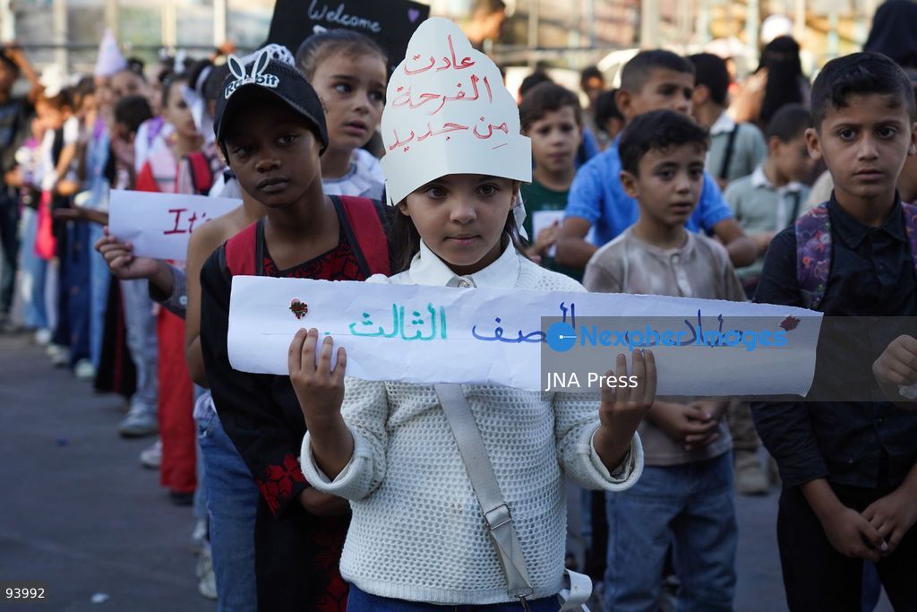 NUSEIRAT, GAZA STRIP, SEPTEMBER 19, 2026: Palestinian children return to classrooms at an UNRWA school in Nuseirat refugee camp in the central Gaza Strip as in-person education gradually resumes following years of disruption caused by the war. The return comes as the new academic year begins in Gaza, where widespread destruction, displacement and the use of school buildings as shelters have severely disrupted access to education. Photo by Ramzi Abu Amer / JNA Press. (Photo by Ramzi Abu Amer/JNA Press via Nexpher Images)